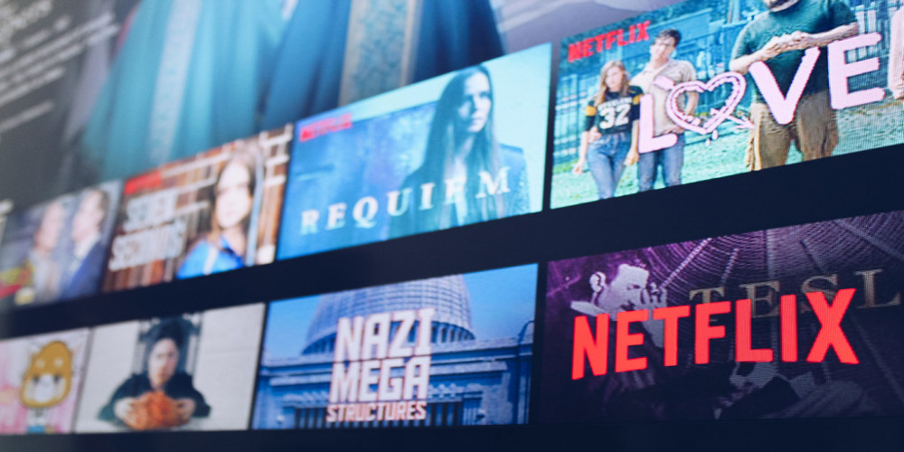 Netflix's subscription tier with advertisements experiences unexpected growth following a sluggish beginning.